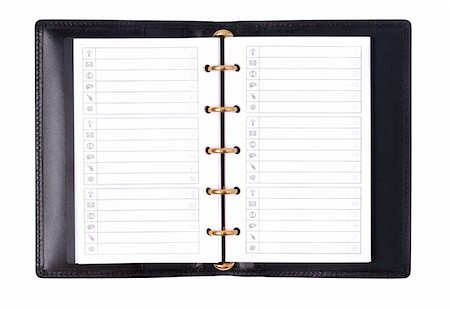 simsearch:640-08089064,k - Black leather organizer isolated with clipping path over white background Photographie de stock - Aubaine LD & Abonnement, Code: 400-04496820