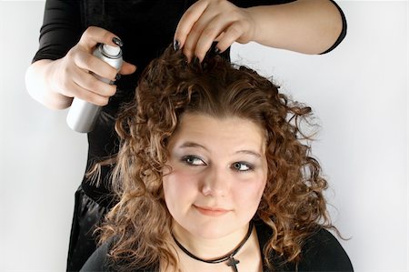 simsearch:400-08094595,k - A girl getting her hair done Stock Photo - Budget Royalty-Free & Subscription, Code: 400-04497385