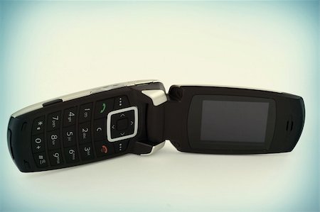 simsearch:400-04558697,k - close-up of mobile phone with a flap Stockbilder - Microstock & Abonnement, Bildnummer: 400-04497530