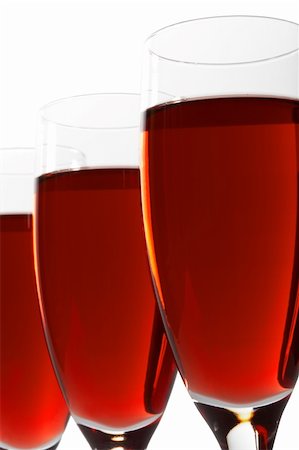 simsearch:400-05286682,k - Three glasses with red wine on a white background Stock Photo - Budget Royalty-Free & Subscription, Code: 400-04497889