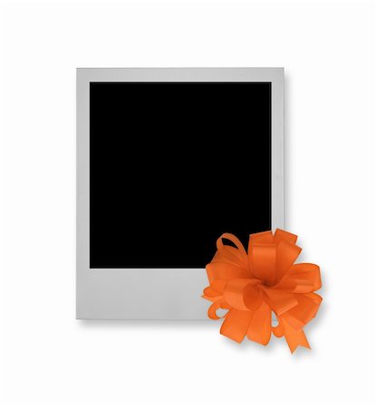 simsearch:400-05117367,k - single photo frame with decorative bow Stock Photo - Budget Royalty-Free & Subscription, Code: 400-04498514