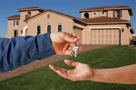 simsearch:400-04478863,k - Handing Over the Keys to A New Home Stock Photo - Budget Royalty-Free & Subscription, Code: 400-04498556