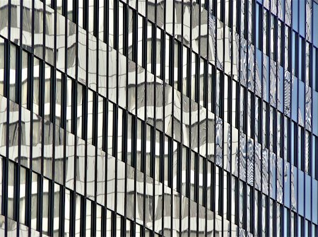 simsearch:400-04458373,k - Closeup of reflections onto a glass building Stock Photo - Budget Royalty-Free & Subscription, Code: 400-04498926