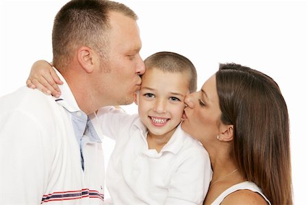 Adorable little boy getting kisses from his mother and father.  Isolated on white. Stock Photo - Budget Royalty-Free & Subscription, Code: 400-04498949