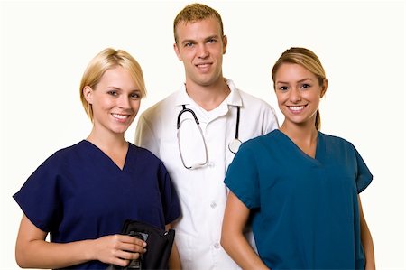 Two woman healthcare workers with one male in the middle wearing a doctors lab coat Stock Photo - Budget Royalty-Free & Subscription, Code: 400-04499004