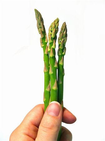 sparkia (artist) - holding asparagus spears Stockbilder - Microstock & Abonnement, Bildnummer: 400-04499073