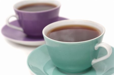 Two beautiful cups from coffee on a white background Stockbilder - Microstock & Abonnement, Bildnummer: 400-04499524