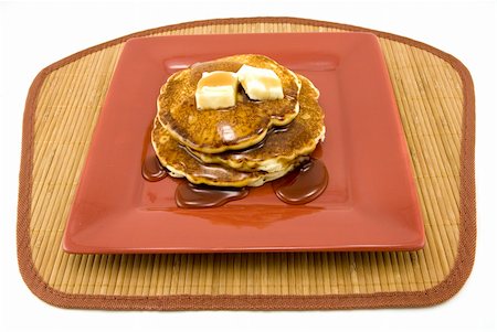 simsearch:400-04055000,k - Plate of pancakes and syrup isolated on white background. Photographie de stock - Aubaine LD & Abonnement, Code: 400-04499533