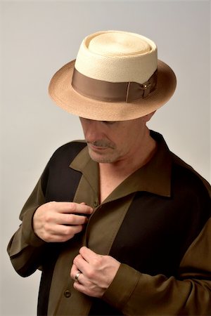 Man in Porkpie hat going out for the evening Foto de stock - Royalty-Free Super Valor e Assinatura, Número: 400-04490045