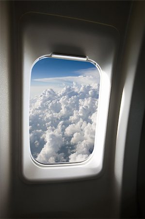 A view of clouds from an airplane window. Stock Photo - Budget Royalty-Free & Subscription, Code: 400-04490322