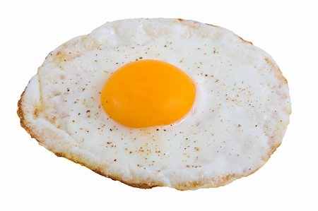 Closeup of Fried Egg isolated over white background Stock Photo - Budget Royalty-Free & Subscription, Code: 400-04490579