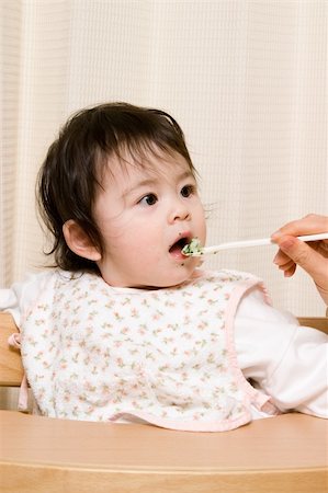 pictures of baby eating dinner with family - Baby having her food Stock Photo - Budget Royalty-Free & Subscription, Code: 400-04490583