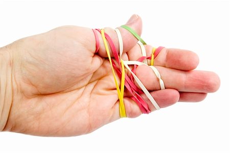 simsearch:400-07167932,k - A male hand tangled in a mess of rubber bands.  Isolated on white with clipping path. Foto de stock - Super Valor sin royalties y Suscripción, Código: 400-04491404