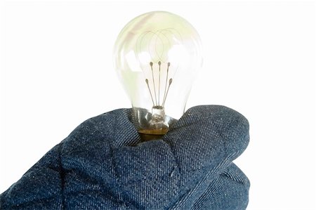 pot holder - A light bulb being held by an oven mitt.  Isolated on white with clipping path. Stock Photo - Budget Royalty-Free & Subscription, Code: 400-04491430