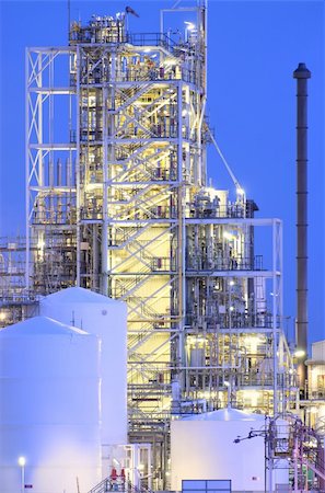 silo pipe picture - Chemical tower as part of a large production facility on a river bank Stock Photo - Budget Royalty-Free & Subscription, Code: 400-04491492