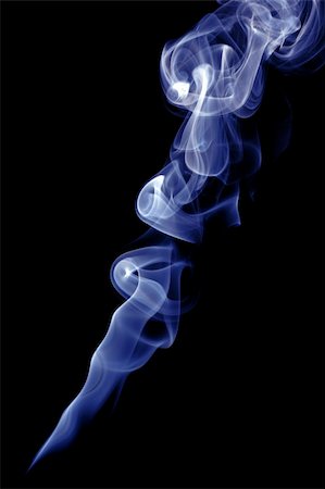 peaceful human - smoke of inscense in the dark Foto de stock - Super Valor sin royalties y Suscripción, Código: 400-04491907