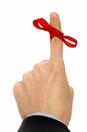 finger knot reminder - red ribbon tied on finger as a reminder Stock Photo - Budget Royalty-Free & Subscription, Code: 400-04491933