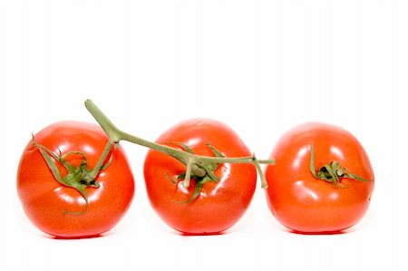 three red tomatos on the white background Stock Photo - Budget Royalty-Free & Subscription, Code: 400-04491992