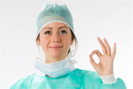 simsearch:400-04699159,k - young nurse just after operation in surgery Stock Photo - Budget Royalty-Free & Subscription, Code: 400-04492083
