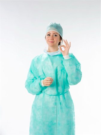 simsearch:400-05060422,k - nurse in operation dress taking poses Stock Photo - Budget Royalty-Free & Subscription, Code: 400-04492114