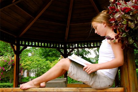 elenathewise (artist) - Young girl sitting in a gazeebo reading a book Stock Photo - Budget Royalty-Free & Subscription, Code: 400-04492829