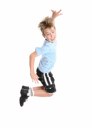 Active, energetic and happy go lucky boy leaping and smiling.  fitness or concept Stockbilder - Microstock & Abonnement, Bildnummer: 400-04492854