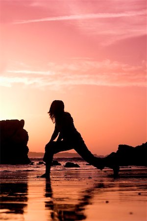 simsearch:400-04215852,k - Woman doing exercise on the beach Stock Photo - Budget Royalty-Free & Subscription, Code: 400-04493644