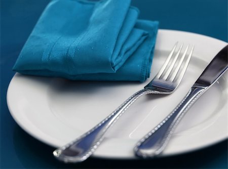 restaurant in blue with table setting - A bright and colorful table setting in blue Stock Photo - Budget Royalty-Free & Subscription, Code: 400-04493689