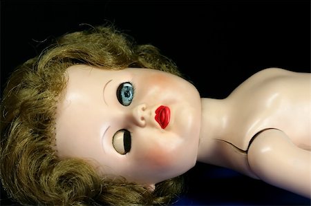 simsearch:400-03945849,k - An old antique doll with one eye closed Foto de stock - Royalty-Free Super Valor e Assinatura, Número: 400-04493683