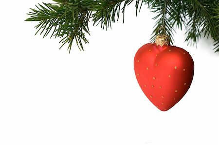 round ornament hanging of a tree - Isolated christmas-tree decoration - red heart Stock Photo - Budget Royalty-Free & Subscription, Code: 400-04493703