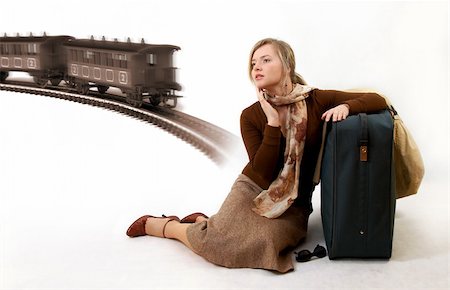 woman with huge bag is waiting for train Photographie de stock - Aubaine LD & Abonnement, Code: 400-04493823