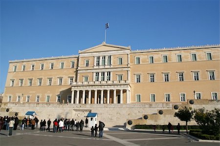 The building of the Greek parliament in Athens. People are watching the traditional guards (evzones) Stock Photo - Budget Royalty-Free & Subscription, Code: 400-04493862