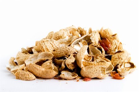 peanut object - Peanut shells in a pile over white Photographie de stock - Aubaine LD & Abonnement, Code: 400-04493907