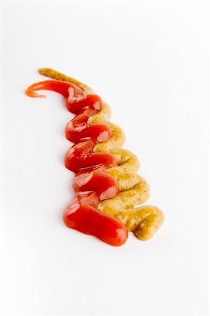 dijon - Ketchup and mustard isolated on white. Foto de stock - Royalty-Free Super Valor e Assinatura, Número: 400-04493918