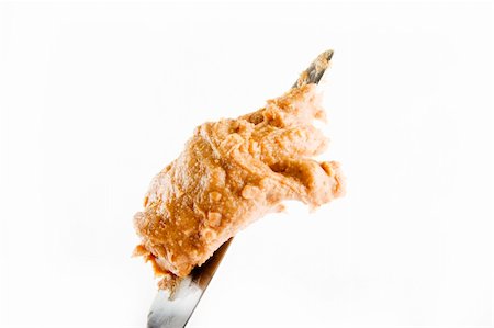 peanut object - Peanut Butter helping on a knife with a white background Photographie de stock - Aubaine LD & Abonnement, Code: 400-04493924
