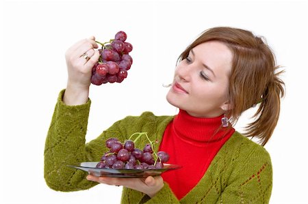 young girl is holding grapes in the palm Stock Photo - Budget Royalty-Free & Subscription, Code: 400-04504134