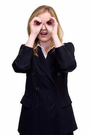 female black real estate agent - Attractive blonde woman in professional business suit standing on white looking through hands curved over eyes in the shape of eyeglasses or binoculars Foto de stock - Super Valor sin royalties y Suscripción, Código: 400-04504155