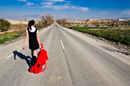 people running away scared - Young girl lefted behind with her teddy bear. Stock Photo - Budget Royalty-Free & Subscription, Code: 400-04504438