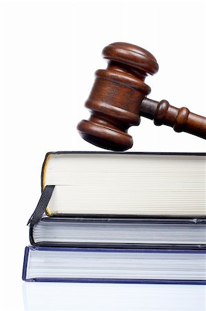 Wooden gavel from the court and law books isolated on white background. Shallow DOF Photographie de stock - Aubaine LD & Abonnement, Code: 400-04504528