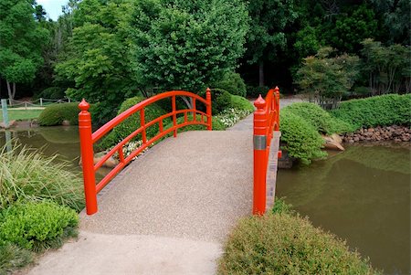 Red Japanses Bridge in a botanical garden Stock Photo - Budget Royalty-Free & Subscription, Code: 400-04504606