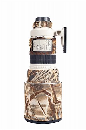 Camera telephoto with camouflage cover isolated on the white background Foto de stock - Super Valor sin royalties y Suscripción, Código: 400-04504756