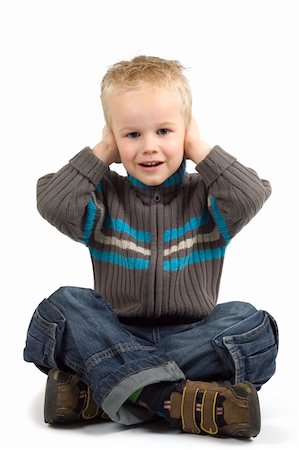 Boy holding his hands against his ears. Stock Photo - Budget Royalty-Free & Subscription, Code: 400-04505570