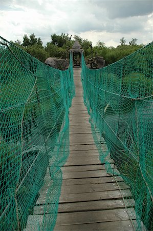 simsearch:400-04833071,k - Suspension bridge over a river. Photographie de stock - Aubaine LD & Abonnement, Code: 400-04507076