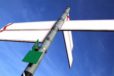 simsearch:400-08033801,k - blank white direction boards with blue sky in the background Stock Photo - Budget Royalty-Free & Subscription, Code: 400-04507184