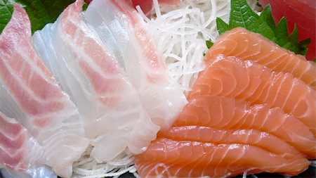 fish bones on plate - served set of japanese raw fish sashimi, macro close-up image Stock Photo - Budget Royalty-Free & Subscription, Code: 400-04507213