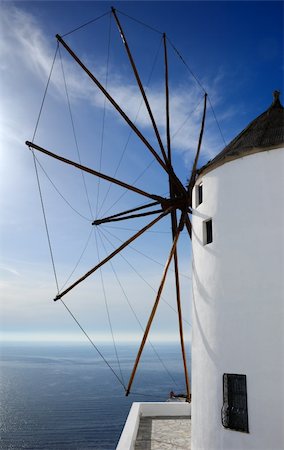 simsearch:400-04718145,k - Image shows a large windmill, on the Greek island of Santorini, overlooking the Aegean Sea Photographie de stock - Aubaine LD & Abonnement, Code: 400-04507235