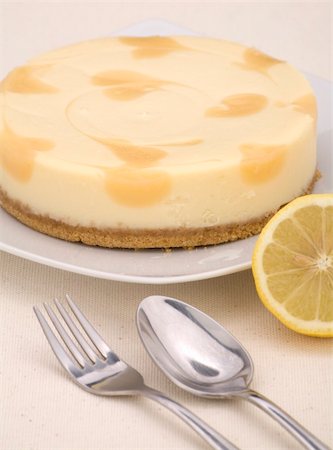 A lemon cheesecake on a linen background. Stock Photo - Budget Royalty-Free & Subscription, Code: 400-04507295