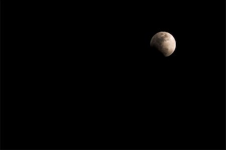 simsearch:400-04349997,k - The moon during a rare lunar eclipse. Foto de stock - Royalty-Free Super Valor e Assinatura, Número: 400-04507969