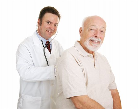 simsearch:400-04117274,k - Doctor listening to a senior man's lungs.  Both smiling at camera.  Isolated. Photographie de stock - Aubaine LD & Abonnement, Code: 400-04508302