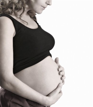 simsearch:400-07892376,k - pregnant woman's stomach Foto de stock - Royalty-Free Super Valor e Assinatura, Número: 400-04508599